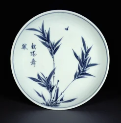 Blue and white kosometsuke saucer dish painted with bamboo and calligraphy, Tianqi mark and period, 1621-27
