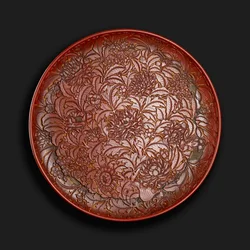 Carved dish bearing the mark of Xuande (1426-36) in the base, Chinese