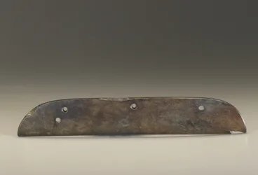 Ceremonial implement; comb-shaped blade form