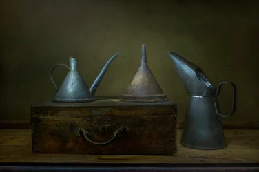 Aged Metal Pouring Tools
