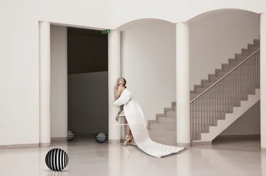 Elegant Ballerina in White Gown