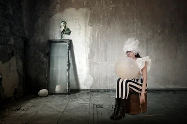 Feathered Woman With Balloon