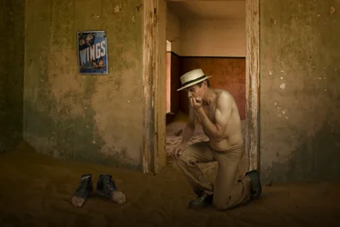 Man in Abandoned Room