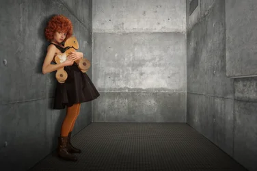Young Girl Concrete Room
