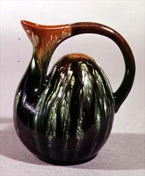 Camel-back jug, Linthorpe, by Christopher Dresser