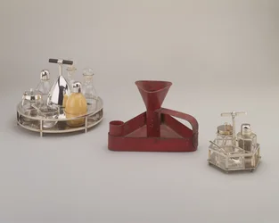 Electroplated Silver Cruet Set, Elkington & Co.; Red Tinned Iron Triangular Drip Pan Chamberstick, Richard Perry, Son & Co.; Electroplated Silver Cruet Set, Hukin & Heath