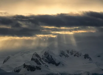 Golden Rays Over Mountains