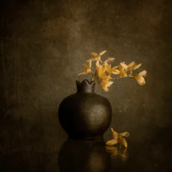Golden Blossoms in a Dark Vase