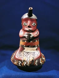 Anthropomorphic vessel of music subject, Peru