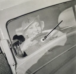 A woman driving, c.1930s