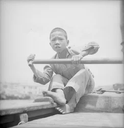 A sampan boy at Hong Kong