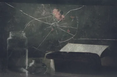Cracked Glass and Old Book