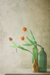 Orange Tulips in Bottles