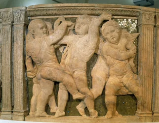 Pulpit of the Cathedral: musical angels. Marble bas-relief for the exterior pulpit of the Cathedral of Prato, Italy. Sculpture by Donato di Niccolò Donatello