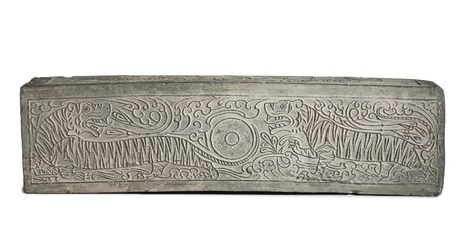 Large molded grey funerary architectural element with two tigers