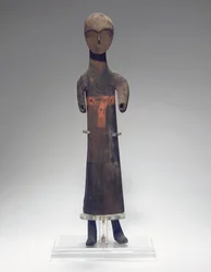 Carved figure of an attendant, 475-221 BC