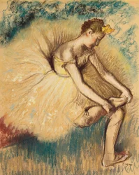 A Dancer Putting on Her Shoe