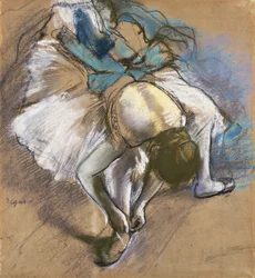 Dancer Putting On Her Shoes