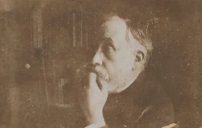 Self-Portrait in Library Hand to Chin
