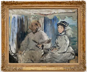 The painter Claude Monet in his studio. (At his side, his wife Camille, in his workshop boat)