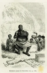 Ketimkuru, tribal leader, playing the accordion. Engraving by Riou to illustrate the account "The Lakes of Equatorial Africa", by Victor Giraud, naval ensign, in 1883-1885, in Le Tour du monde, 1886, under the direction of Édouard Charton (1807-1890)