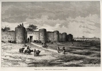 The town of Tiong-Gi, with its fortifications and clay towers. Engraving by Riou, to illustrate the story From Niger to the Gulf of Guinee by Captain Louis Gustave Binger