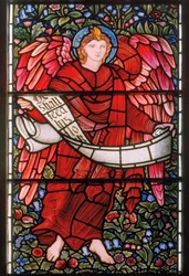 Angel holding a Scroll, East Window