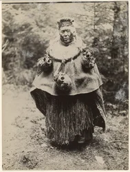 A Kwakiutl Head Hunter Dressed for a Kominaka Dance