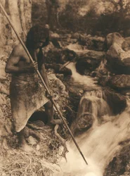 Young American Indian of the Hupa Tribe Fishing Salmon