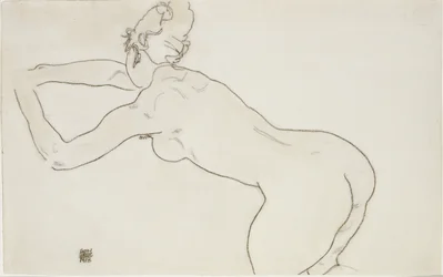 Female nude kneeling and bending forward to the left