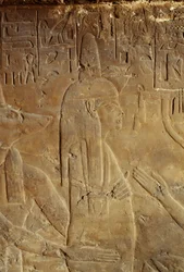 Anubis holding the mummy, relief from the tomb of Maia, wet-nurse of Tutankhamun, Saqqara, Egypt, Egyptian Civilization, New Kingdom, Dynasty XVIII (detail)