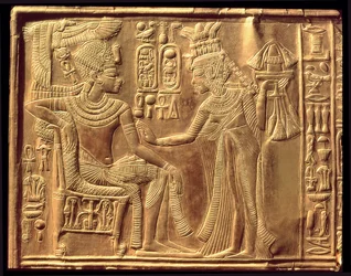 Detail from the Golden Shrine of Tutankhamun depicting the Queen anointing him with scented unguent, New Kingdom (detail)