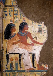 Egyptian antiquity: fresco of the tomb of the painter Maia, the deceased and his wife sitting at a banquet. 18th dynasty. From the Chapel of Maia, Deir el-Medineh, New Empire. Turin, Egyptian Museum