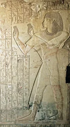 Egyptian antiquity: relief from the tomb of Kha em Het, inspector of attics and scribe at the court of Amenophis III the representative leaving the tomb in prayer. 18th dynasty. Luxor, West Bank, Egypt