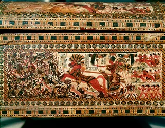 Egyptian Antiquity: Small Wooden Box with Scenes Depicting Pharaoh Tutankhamun Chasing Nubians on His Chariot. 18th Dynasty. From the Tomb of Tutankhamun (1345-1327 BC) Valley of the Kings. Thebes. Dim. 61 cm