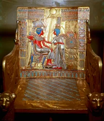 Egyptian Antiquities: A Throne in Gilded and Painted Wood of Tutankhamun. Representation of Queen Ankhesenpaaton Massaging the Shoulder of Her Brother and Husband Tutankhamun Under the Sun