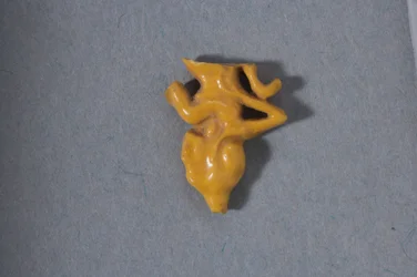 Fragmentary openwork bead of a seated princess, New Kingdom, Amarna period