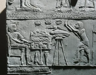 Horemheb eating funerary meal, relief from the tomb of Horemheb at Saqqara