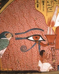 Egyptian antiquity: The artisan Pached kneels in worship near him, the eye of Horus Oudjat. Fresco of the tomb of Pachedou, Deir, el Medinet, Egypt