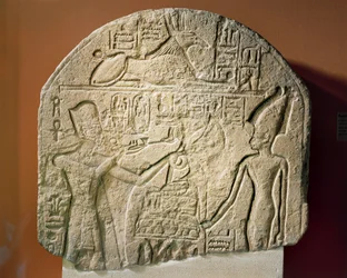 Limestone Stele Depicting Ramses II Offering Incense and Papyrus to the Goddess Astarte