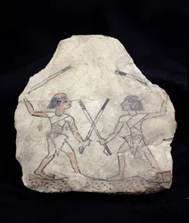 Ostrakon depicting two men fighting with sticks, from Deir El-Medina, New Kingdom