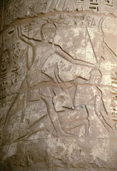 Ramses holding his Asian enemies by their hair while he is preparing to slay them, relief, Temple of Seti I, Kanais, Egypt, Egyptian civilization, New Kingdom, Dynasty XIX