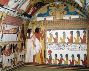 Sennedjem and his wife facing a naos containing twelve divinities, from the west wall of the Tomb of Sennedjem, The Workers
