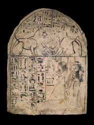 Stela depicting a couple adoring 