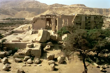 View from the top of the first pylon showing the fallen colossus of Ramesses II in the First Court