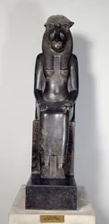 Egyptian antiquity: the lioness deity Sekhmet with the cartridge of King Sheshonq I. Statue of black granite. 950-929 BC. Turin, Egyptian museum