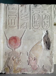 Nectanebo II being embraced by the goddess Isis, fragment from a door, Late Period, c.358-341 BC