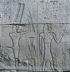 Relief of God Min and Philip III Arrhidaeus at Great Temple of Amon