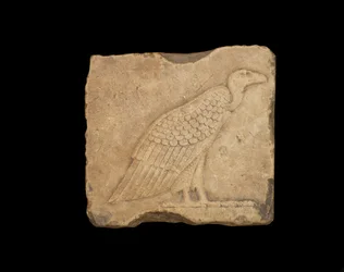 A Block with a Standing Vulture and an Owl in Low Relief