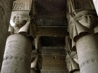 Egyptian Antiquity: Partial View of the Hypostyle Room with Columns Decorated with the Representation of the Goddess Hathor. Temple of Hathor, Denderah, Egypt